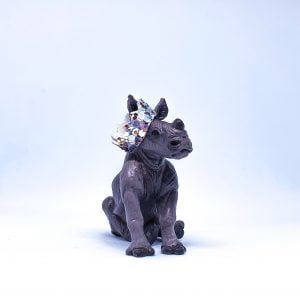 Sitting Rhino Calf Baby