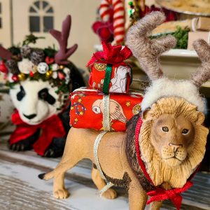 Add a miniature Christmas Liberty fabric present stack to your festive animals...